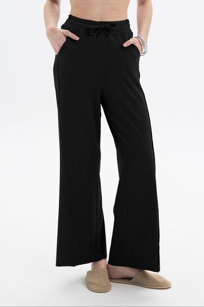 Black and Black B&B x F drawstring relaxed pants with a comfortable fit, shown in a casual style.