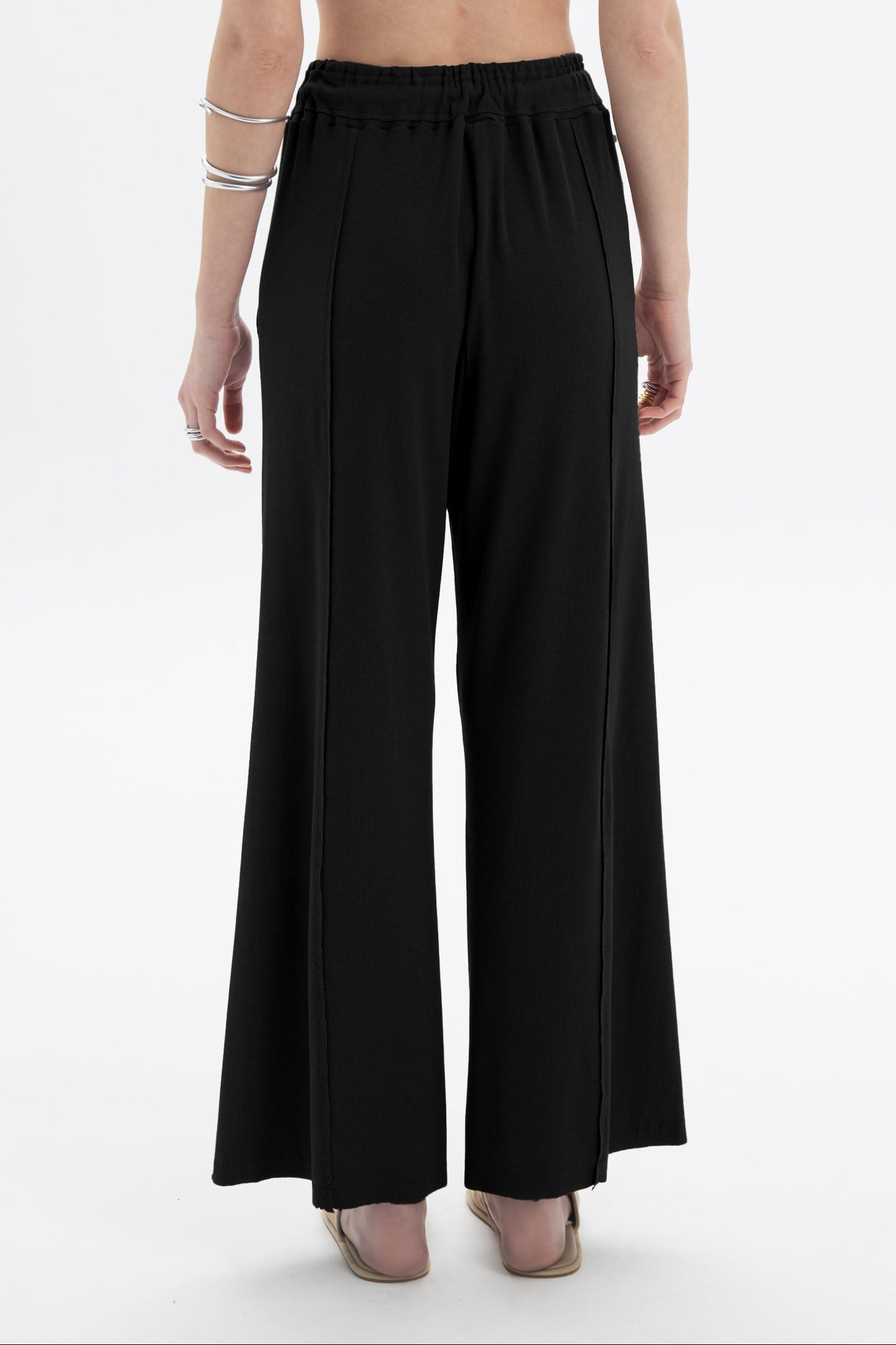 Black and Black B&B x F drawstring relaxed pants with a loose fit and casual style, shown on a neutral background.